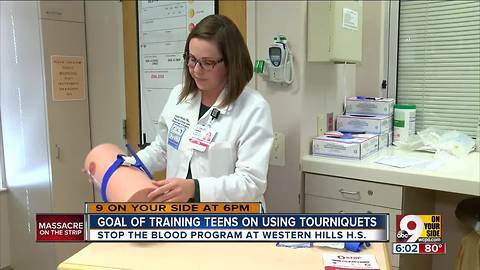 High schoolers learning to use tourniquets