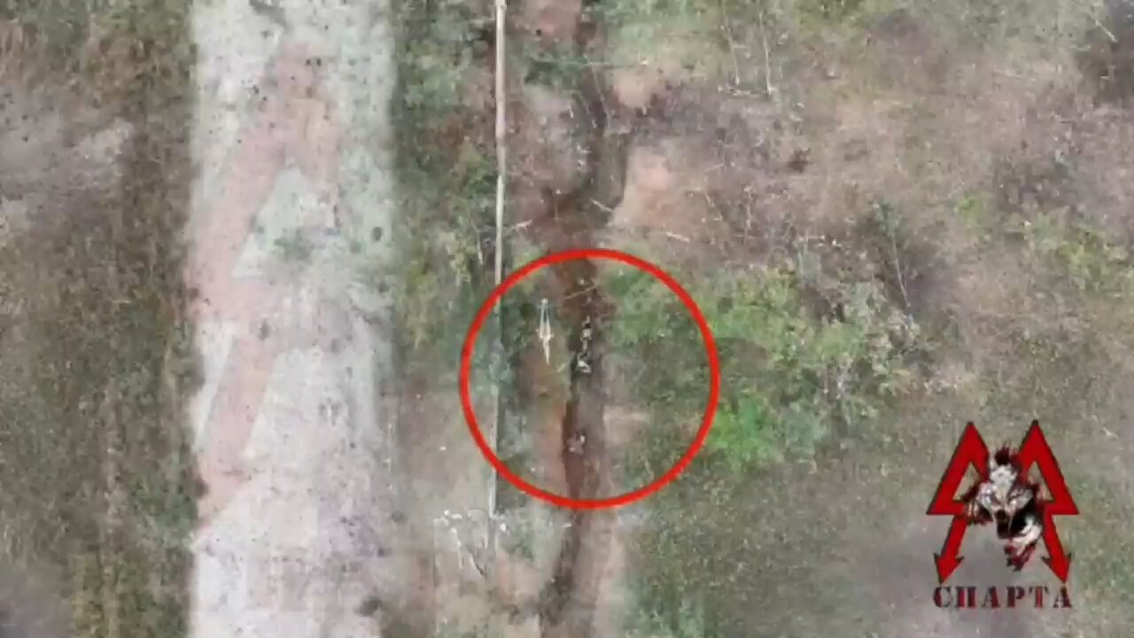 Brutal footage of a Russian drone dropping a Grenade on a Ukrainian trench 🔞