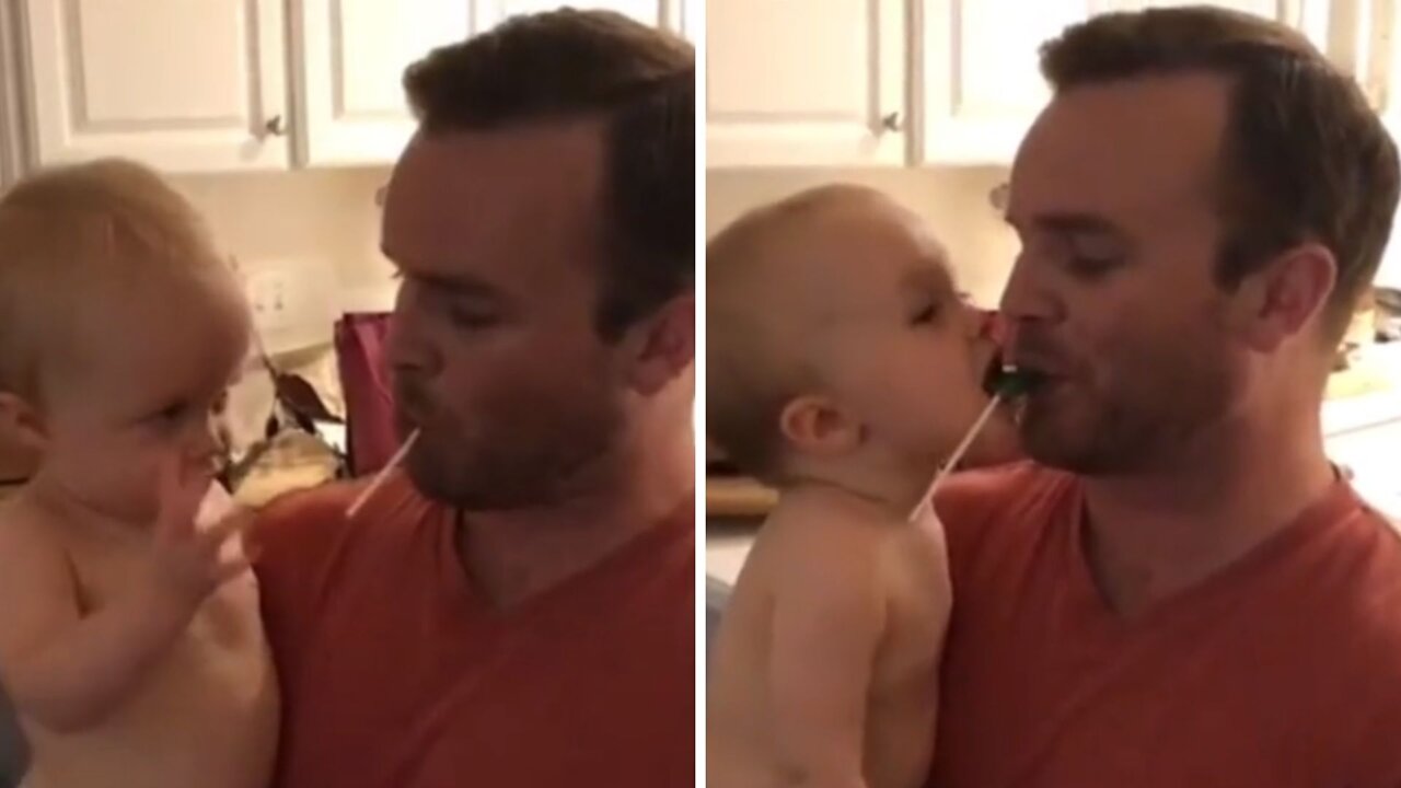 Little boy wants lollipop & tries to get it