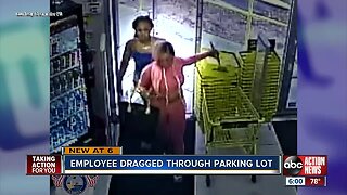 Employee dragged through parking lot