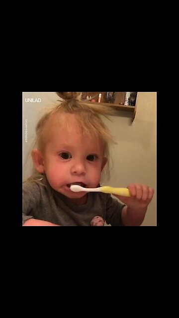 Kid Pretends Her Toothbrush Is Electric