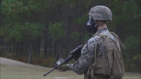 Marines Conduct Shooting Drills with Gas Masks