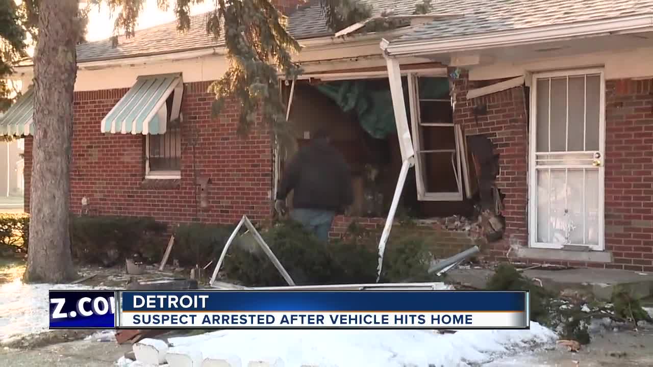 Suspect arrested after vehicle hits home in Detroit