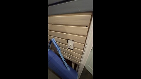 How to hang a coat on slat wall