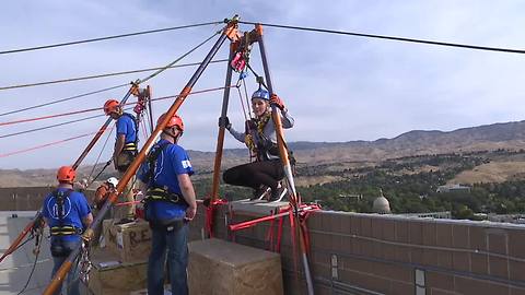 Participants rappel off U.S. Bank as "Over the Edge" fundraiser