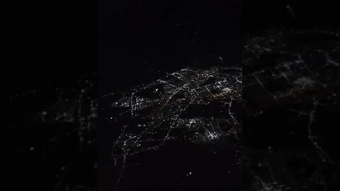 "Skylines Aglow: A Spectacular Night Flight"