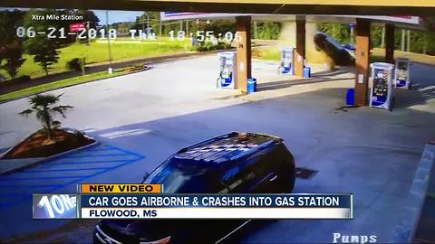 Car goes airborne, slams into gas station