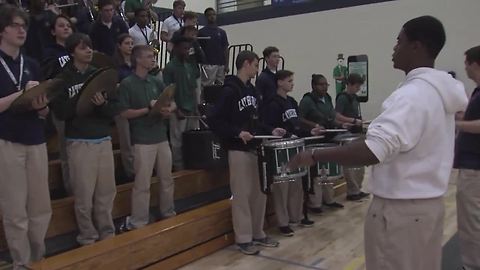 Friday Football Frenzy: Cathedral High School band rallies students for their game against the Center Grove Trojans