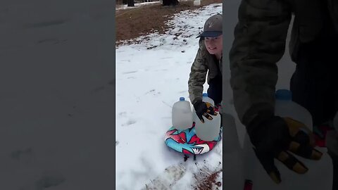 One way to get water to the piglets. #homesteading #winter #farmkids #sledding #countryliving