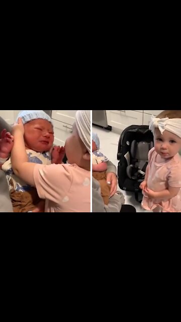 One-year-old Girl Excitedly Meets Her Newborn Baby Brother