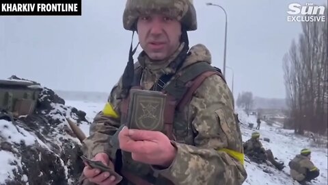 Ukraine War - Ukraine Soldier Shows Off Captured Russian Patches