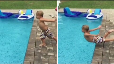 This boy discovers the most complicated way to take a dip in the pool