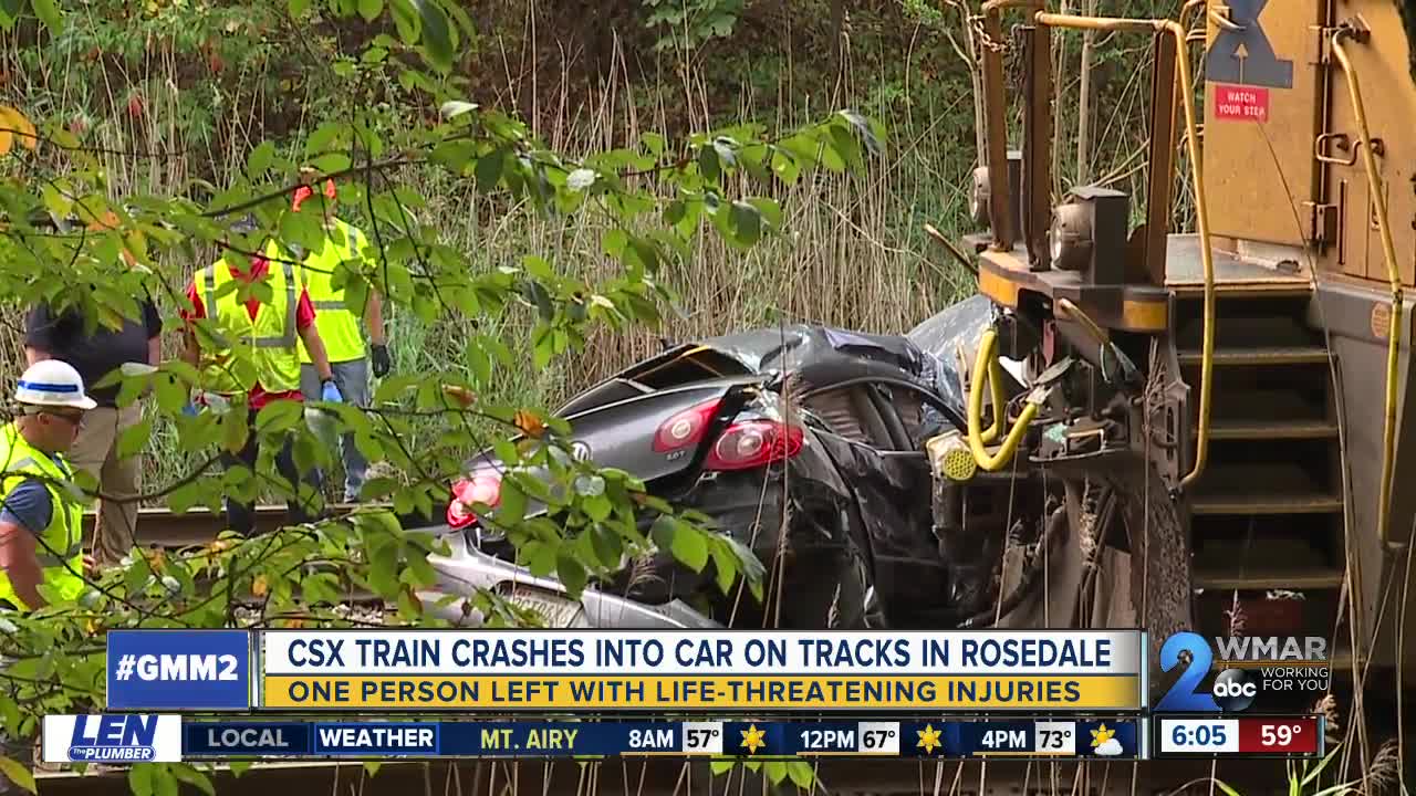 CSX train crashes into car on tracks in Rosedale