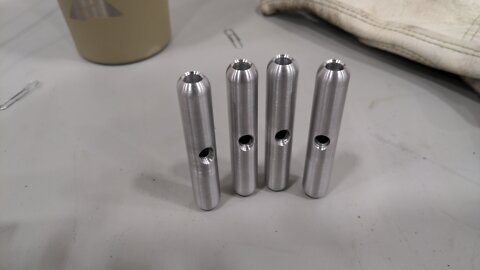 CNC Lathe turning aluminum hammock toggles.