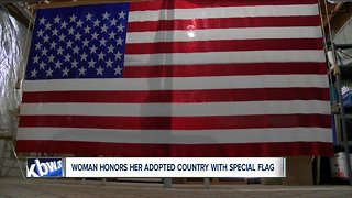 Woman honors her adopted country with special flag