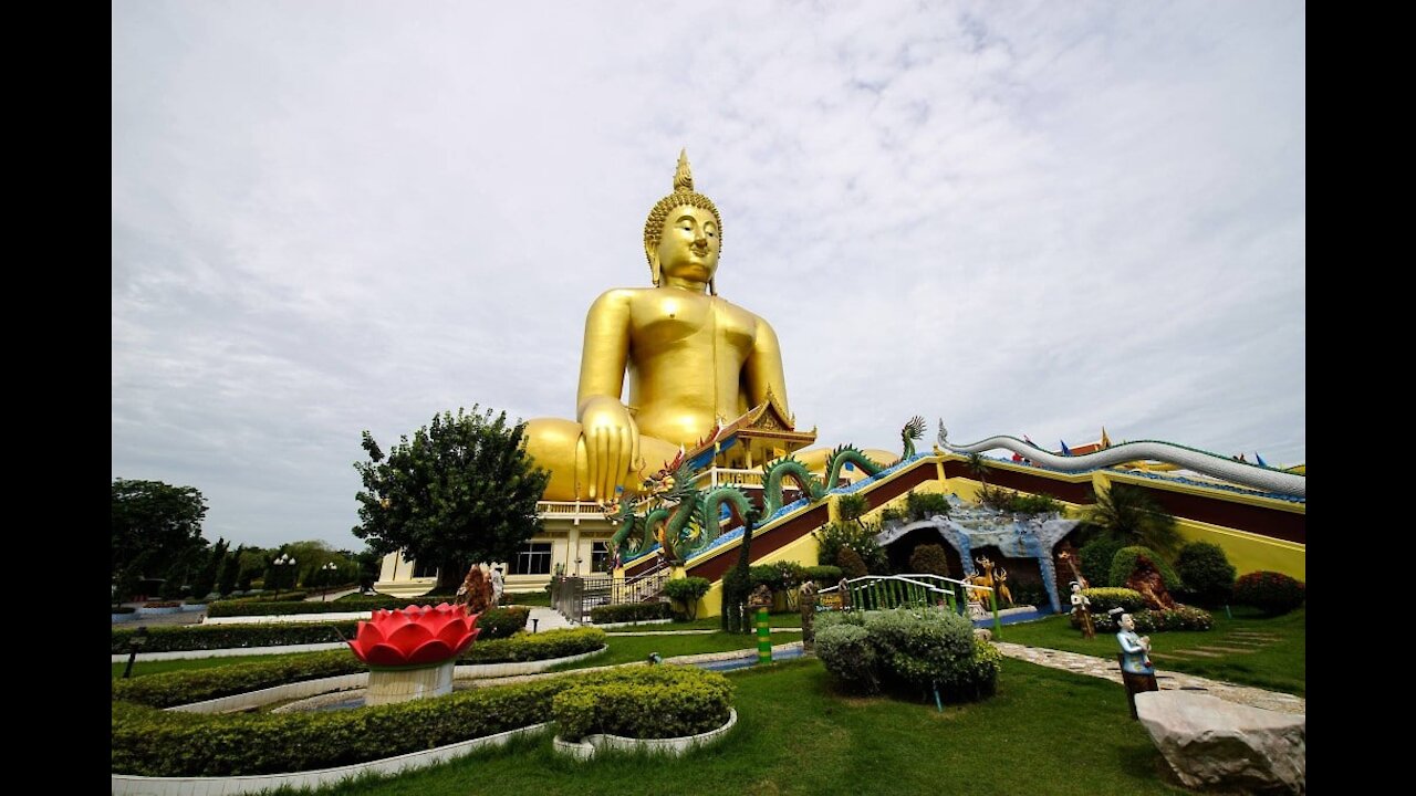 Temple and rice field coffee shop Wat Muang in Ang Thong province in Thailand