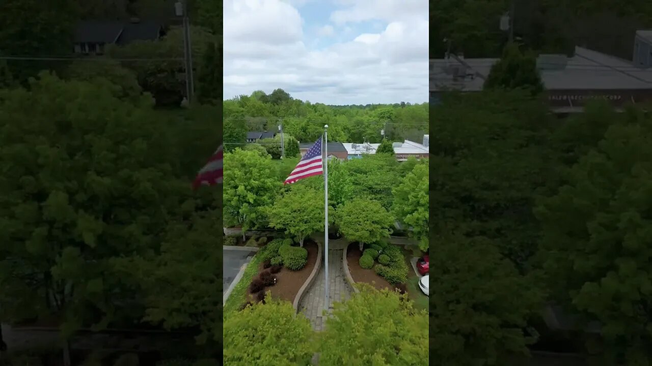 Raising Old Glory: A Stunning Drone View of the American Flag Flying over Randleman, NC