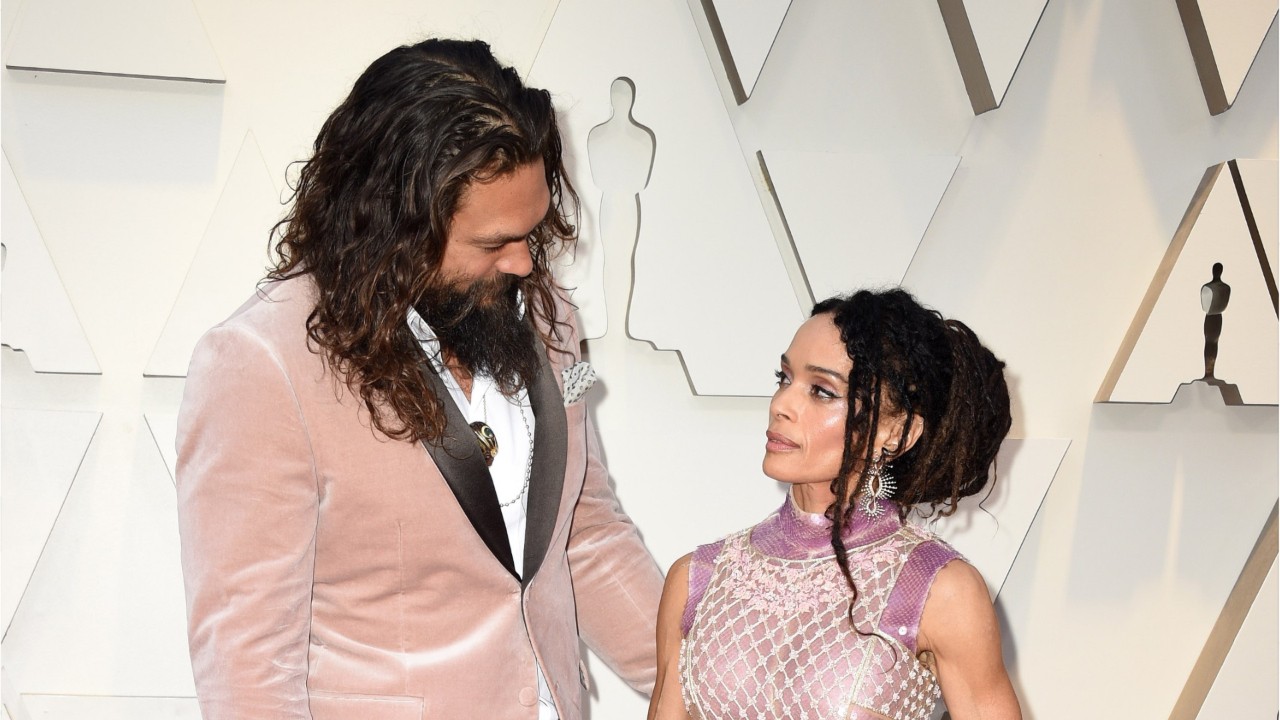 Jason Momoa And Lisa Bonet Wore Last Lagerfeld Collection