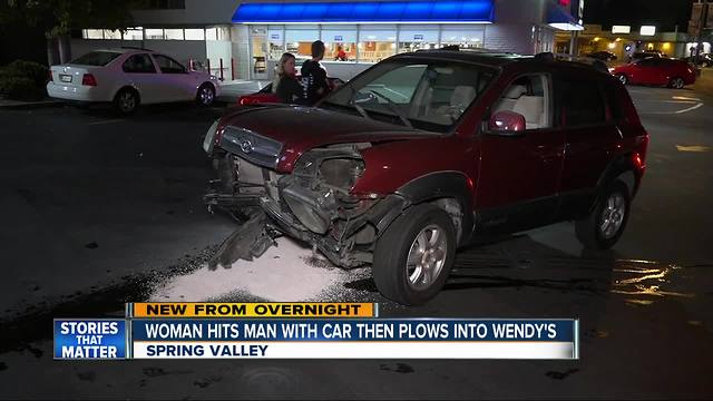 Woman accused of hitting man with vehicle, slamming into wall