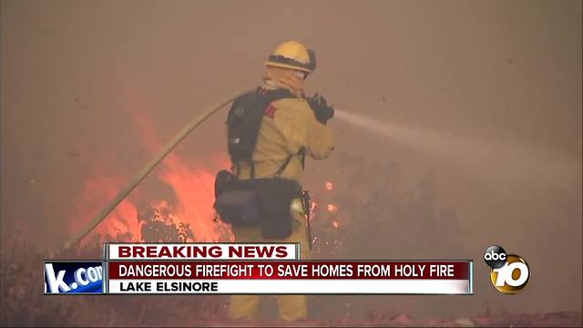 Dangerous firefight to save homes from Holy Fire