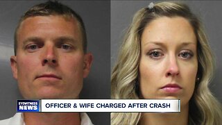 Officer and wife charged after crash