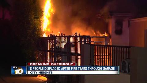 Fire rips through garage at City Heights home