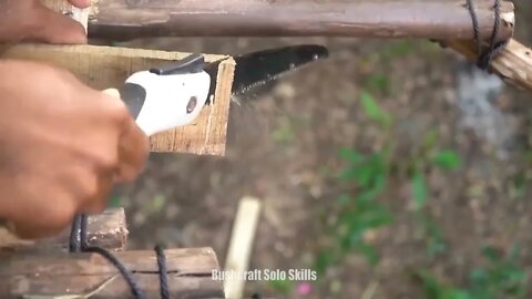 Jungle craft builds cabins from abandoned timber..20