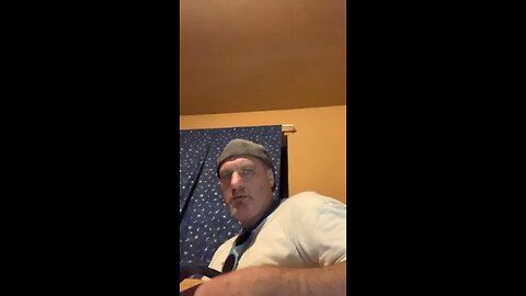 Mink in an old orange robe