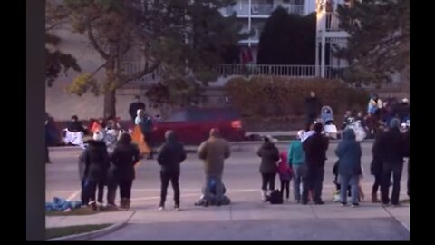 Car Captured Speeding Toward Wisconsin Parade