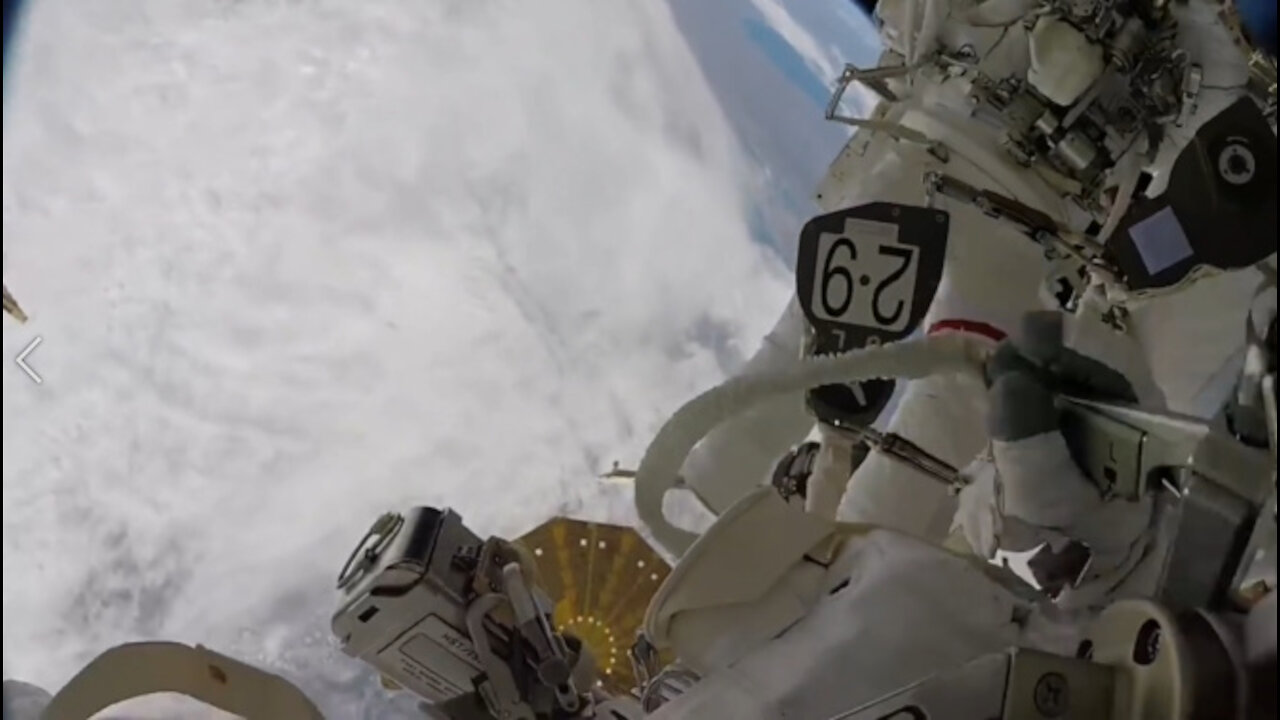 The Earth Is Beautiful As An Astronaut Walks Out of the Space Station