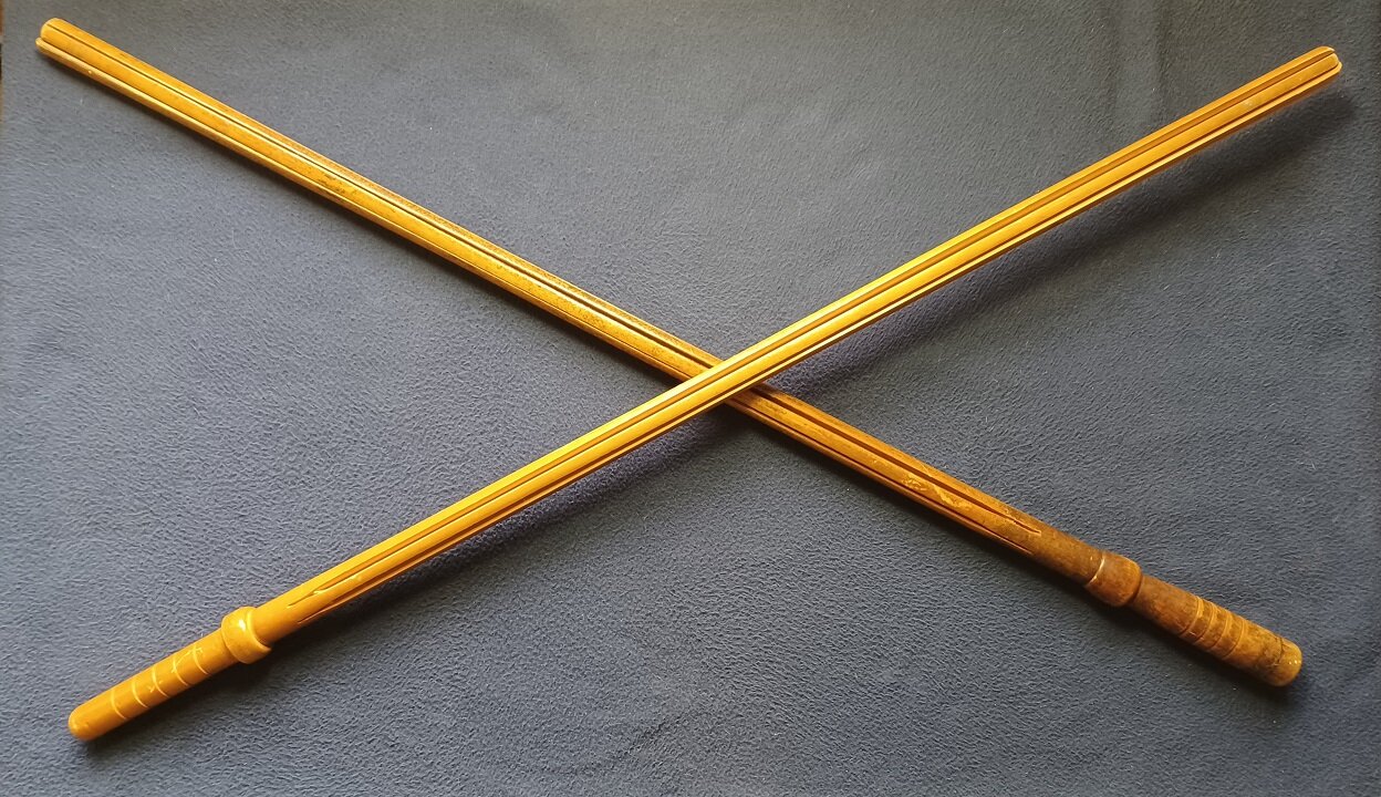 SHOW AND TELL 142: Vintage Newspaper display holders, Sectioned wood rods.