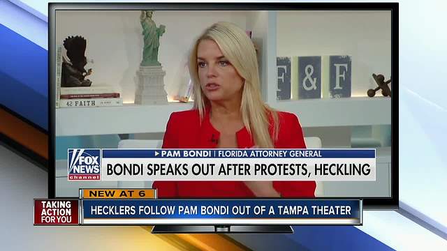 Protesters confront FL Attorney General at 'Won't You Be My Neighbor' showing in Tampa