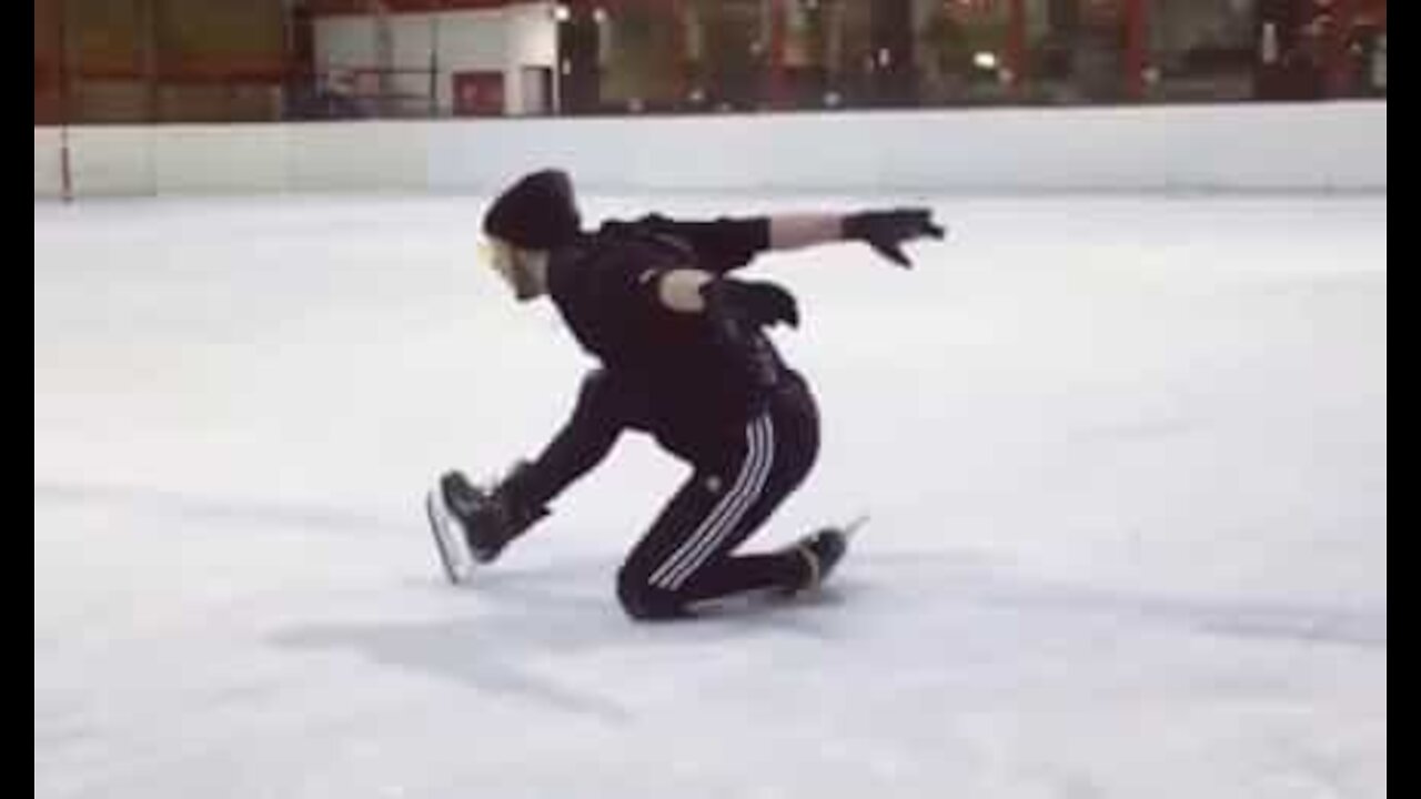 Skater performs awesome trick moves on ice