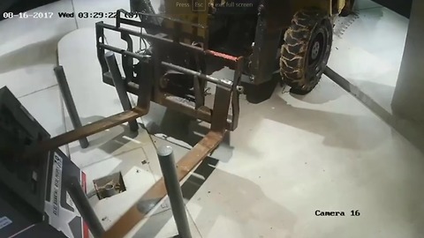 Thieves steal ATM using a forklift