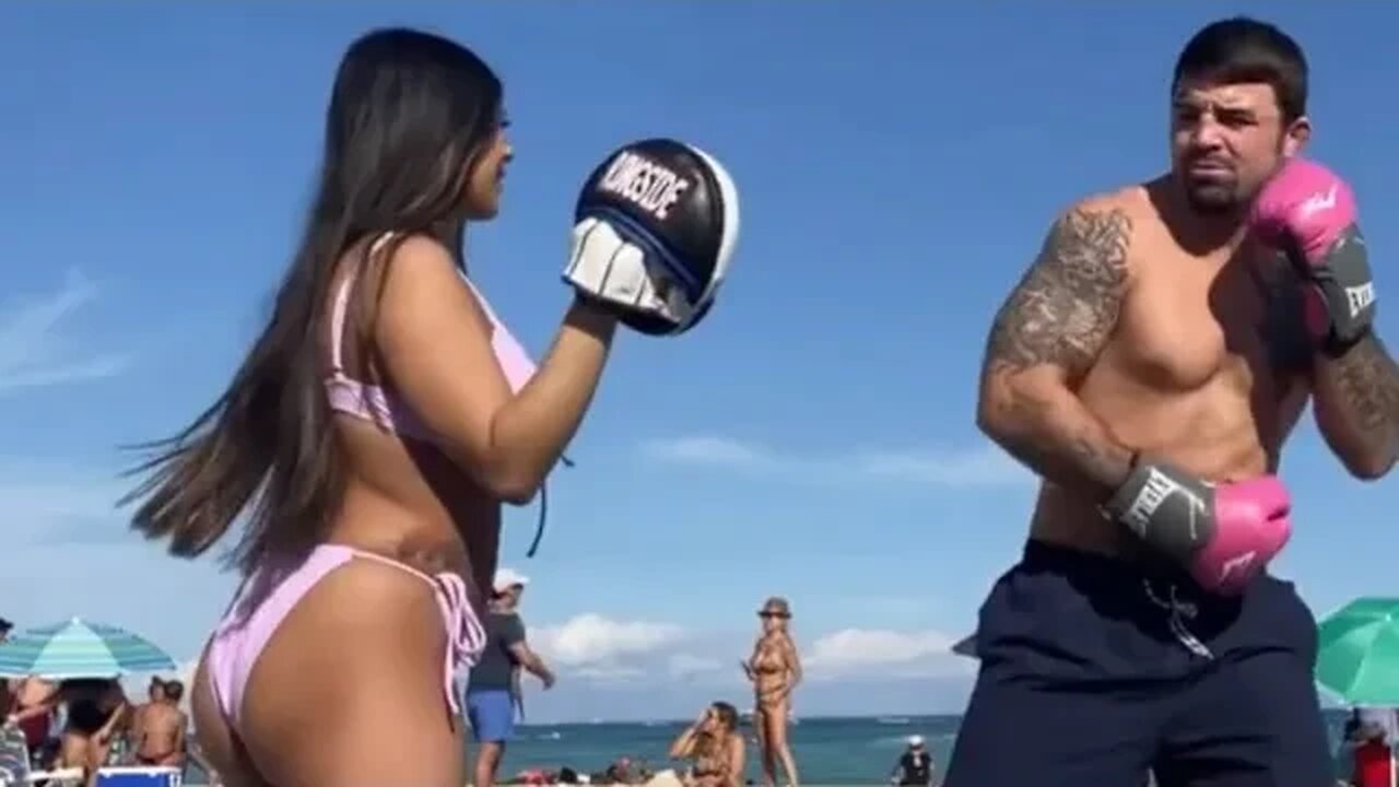 Mike Perry training with Latory Gonzalez on the beach, shows new baby, disses Jake Paul