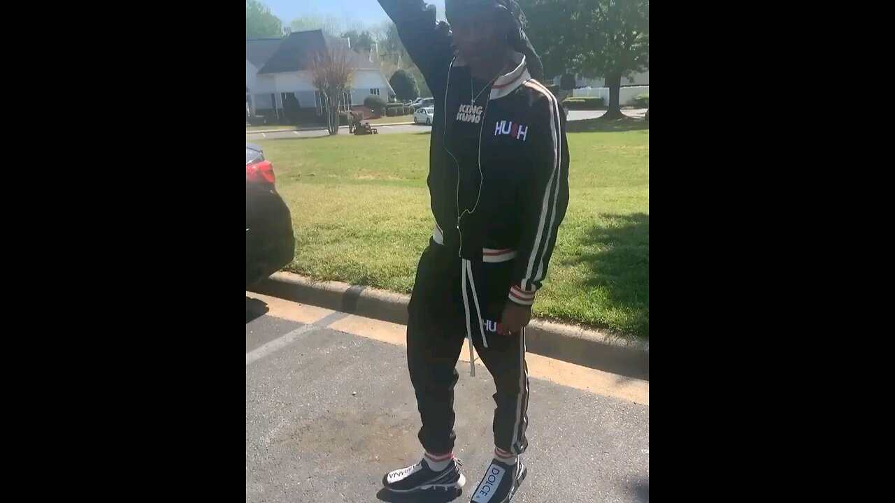 King kumo vibin out in Custom HUSH Track suit