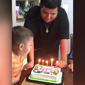 A Tot Boy Spits On The Cake Instead Of Blowing Out The Candles