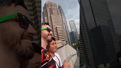 Malaysian lads try to ride their suitcase, then take selfie with me