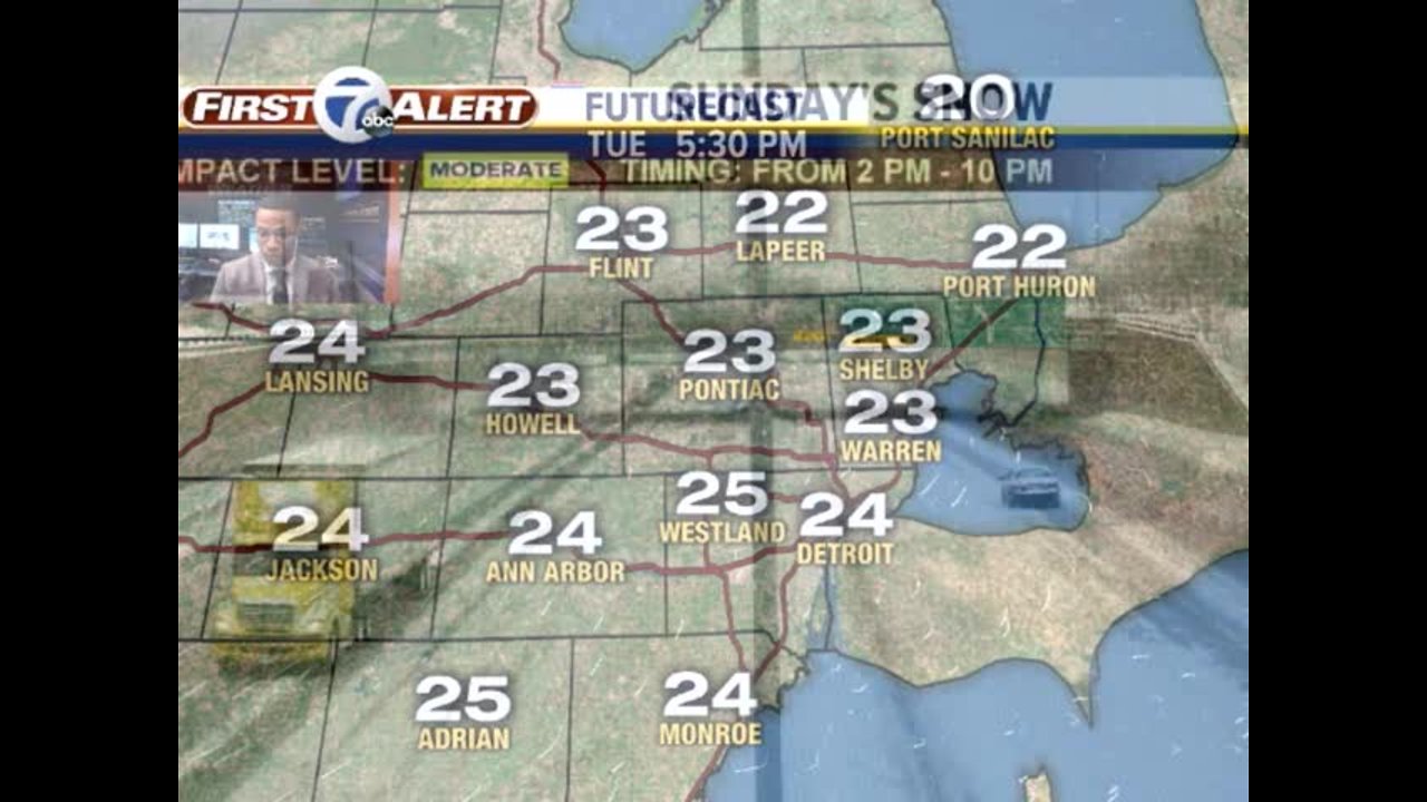 Snow moving through Metro Detroit