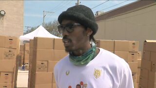 Former pro-basketball player Mike Taylor delivers essential needs 'assist' to community