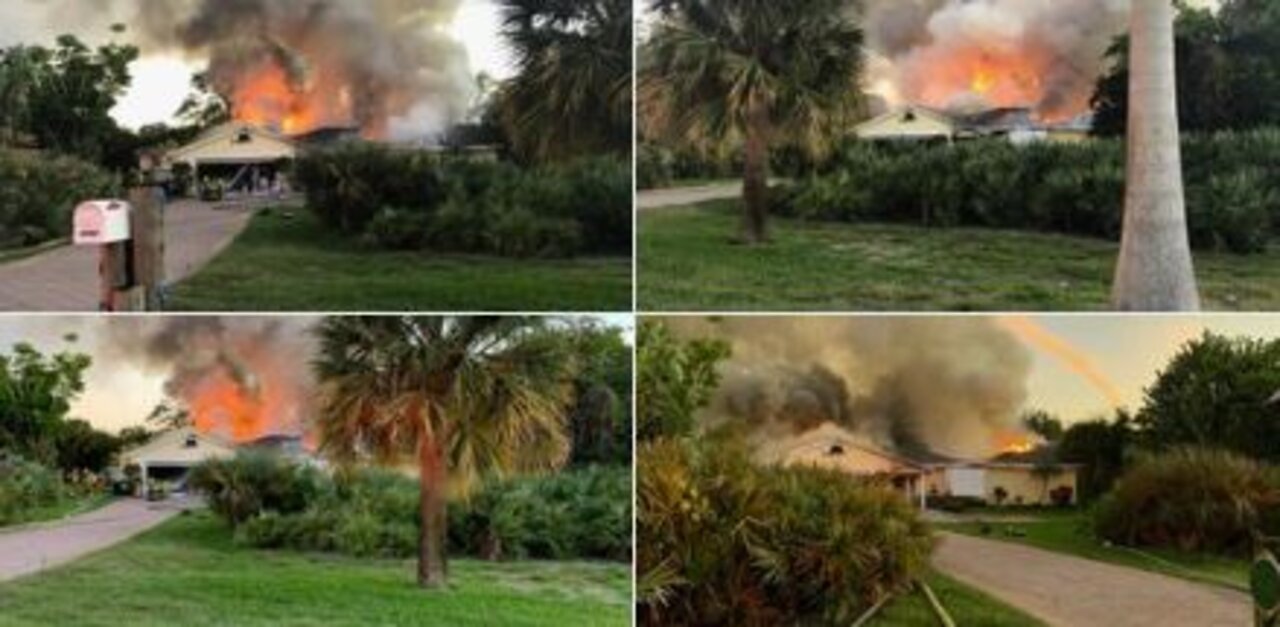 Crews battling large house fire in Stuart