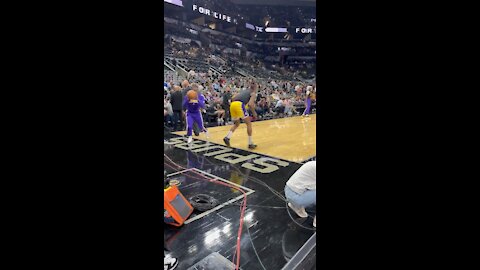 Lakers are still doing their 🏈 routine pregame, here with QB Rondo, OL Dwight and WR/TE AD.