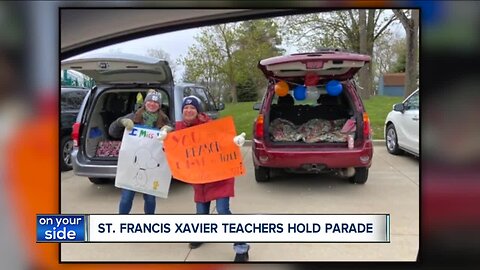 Teachers from St. Francis Xavier School in Medina hold parade for students