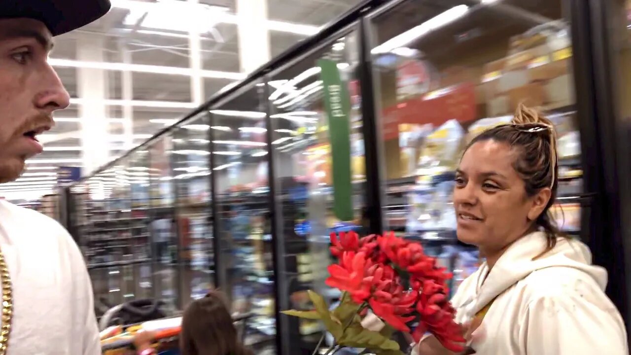 Wanksta giving flowers to single moms