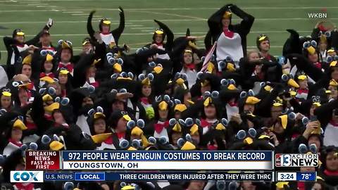 Penguin people: 972 people wear penguin costumes to break record