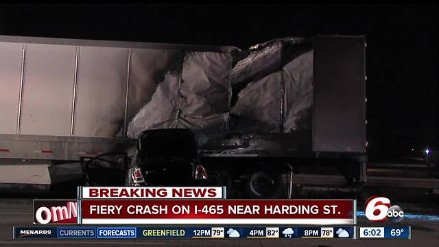 Indiana State trooper pulls two people from fiery crash after car ends up under semi on I-465 near Harding Street