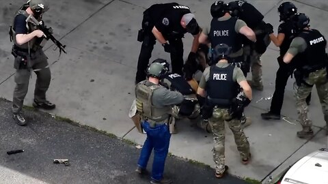 Wanted Fugitive Shot and Killed by Cops After He Pointed Guns at Them