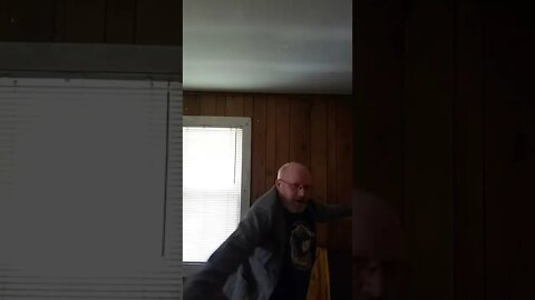 Fat man in a little coat