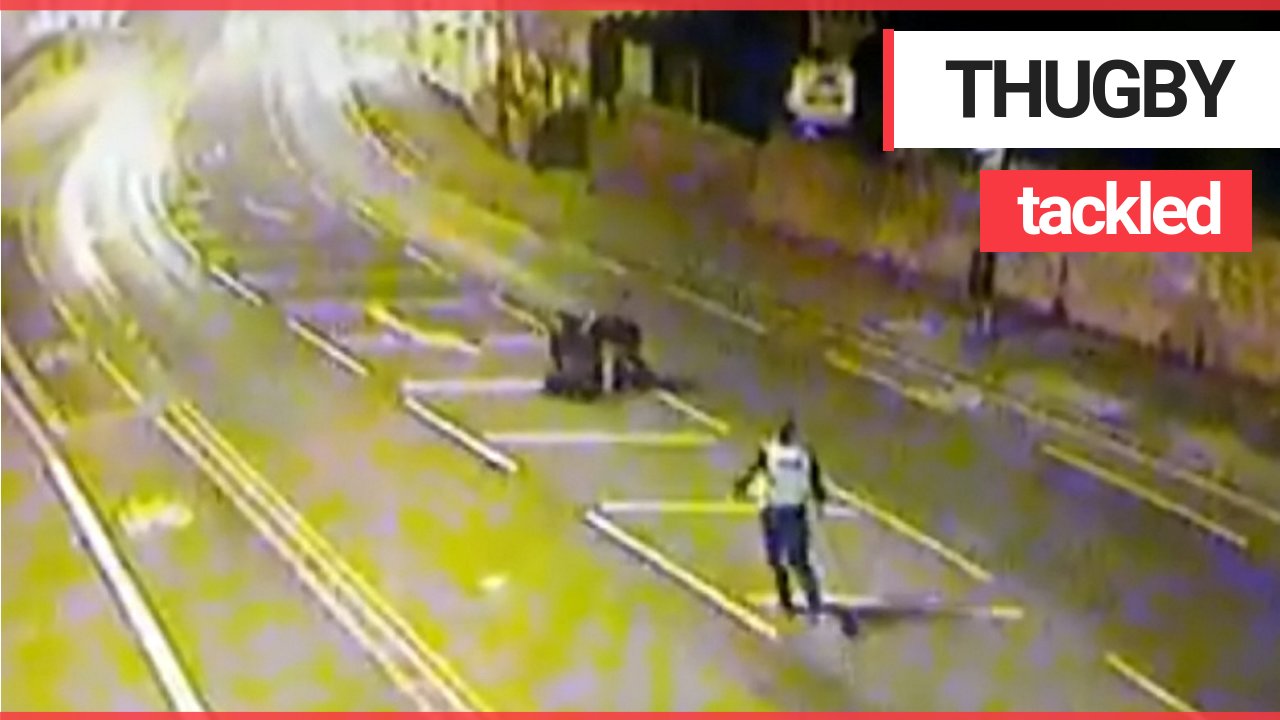 Police thank two have-a-go-hero pals captured on CCTV rugby tackling a wanted man