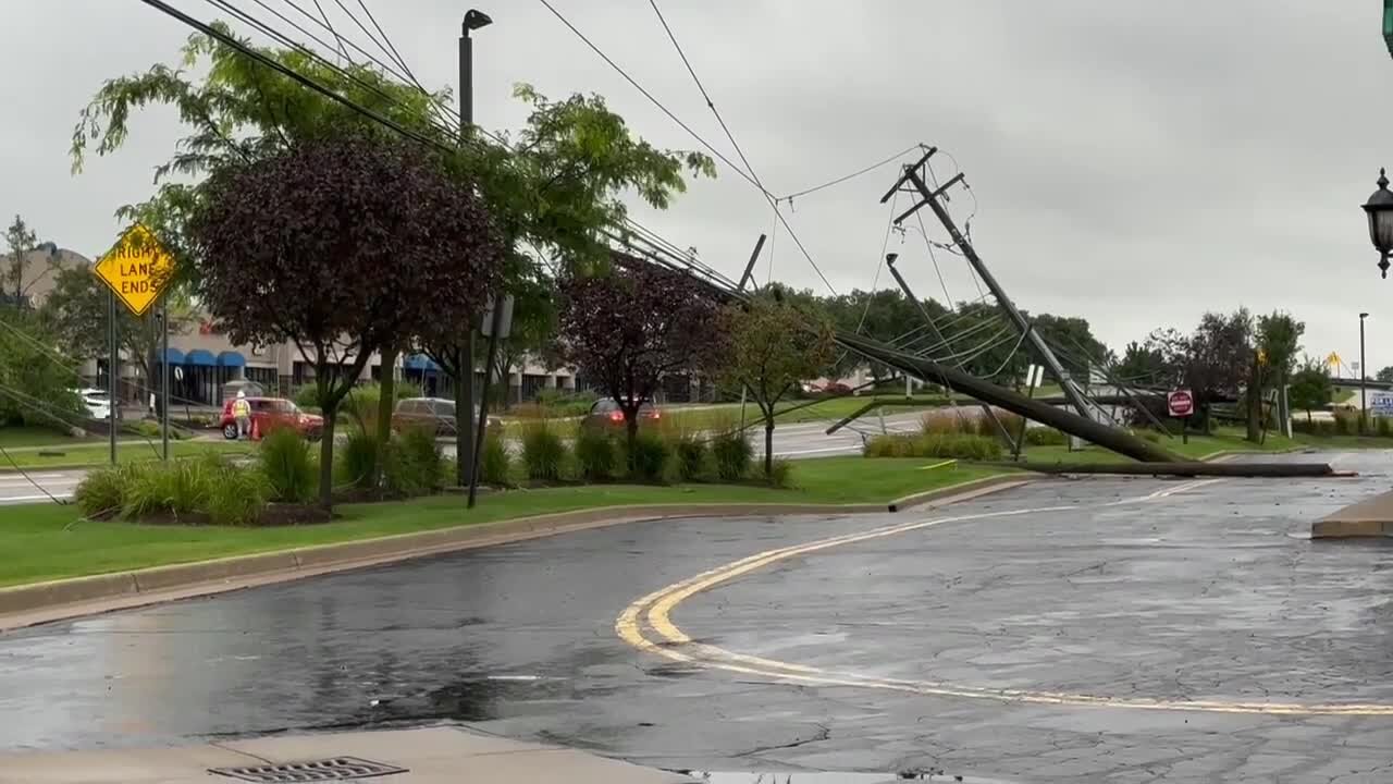 Snapped power poles close Haggerty Road